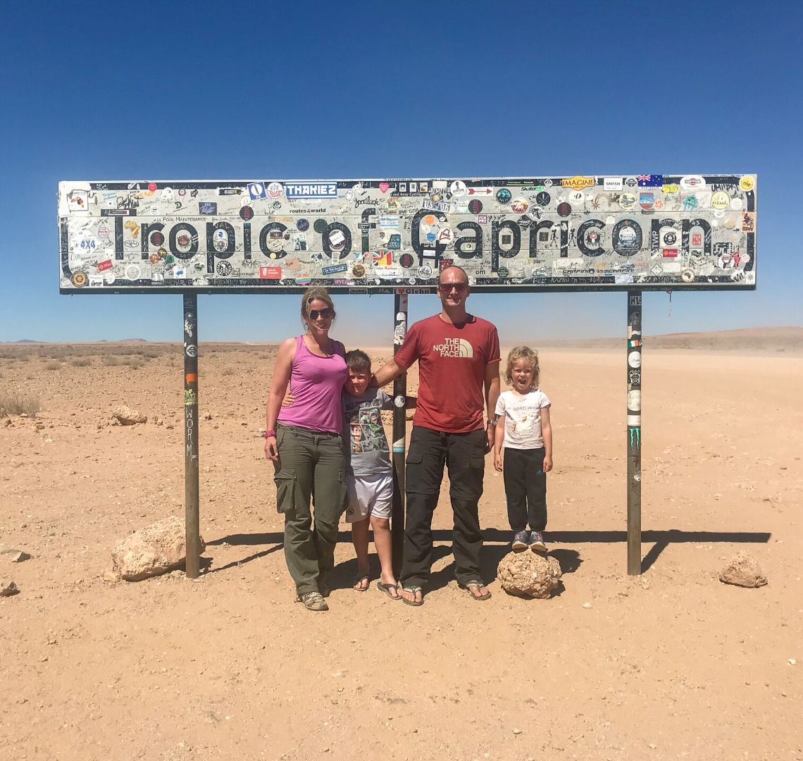 You have to stop to break up the monotony of the drive so we stopped as we crossed the Tropic of Capricorn and took a family photo under the sign! The sign is decorated with stickers and graffiti from past visitors.