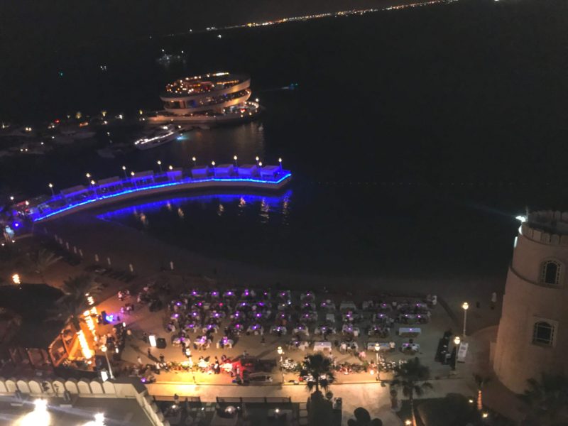 Four Seasons Doha - view from our room across the Barefoot Beach BBQ night, The Pier and Nobu