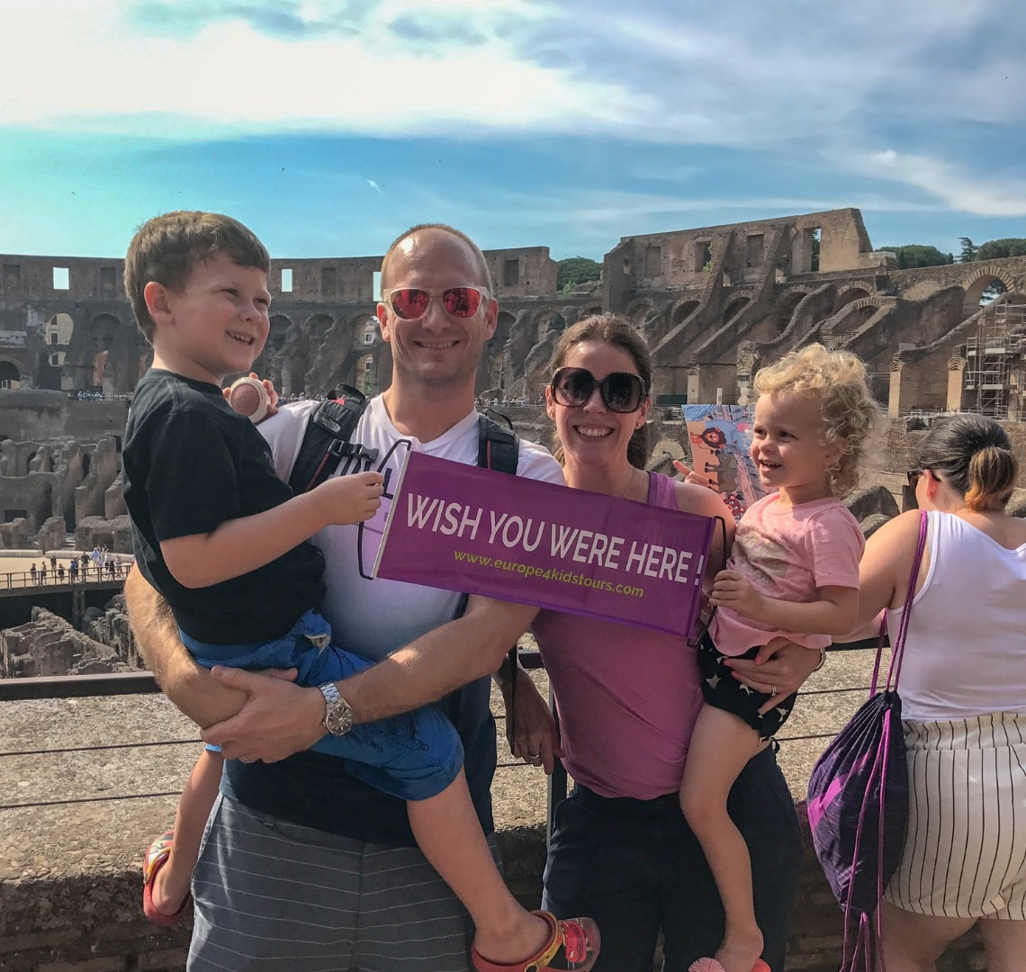 How to have an epic family holiday - Wanderlust family photo in coliseum Rome