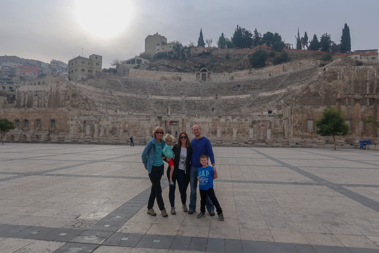 Throw away the bucket list - Wanderlust family and Granny Wanderlust in teh roman theatre Amman Jordan