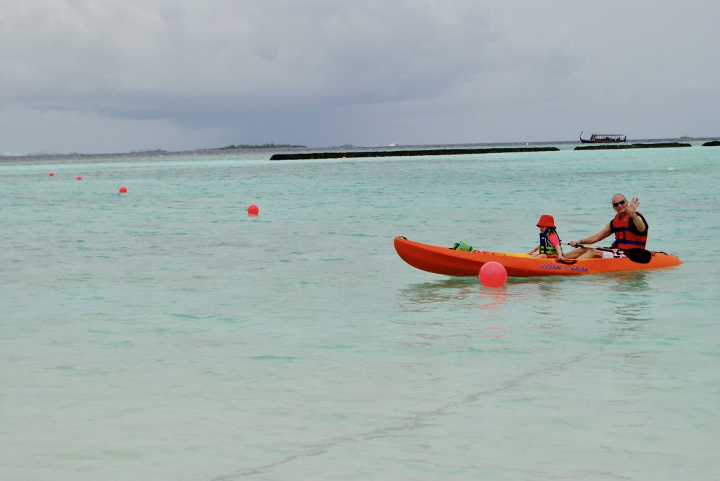 Mr Wanderlust and Thing 1 in a kayak in the Maldives - trip of a lifetime