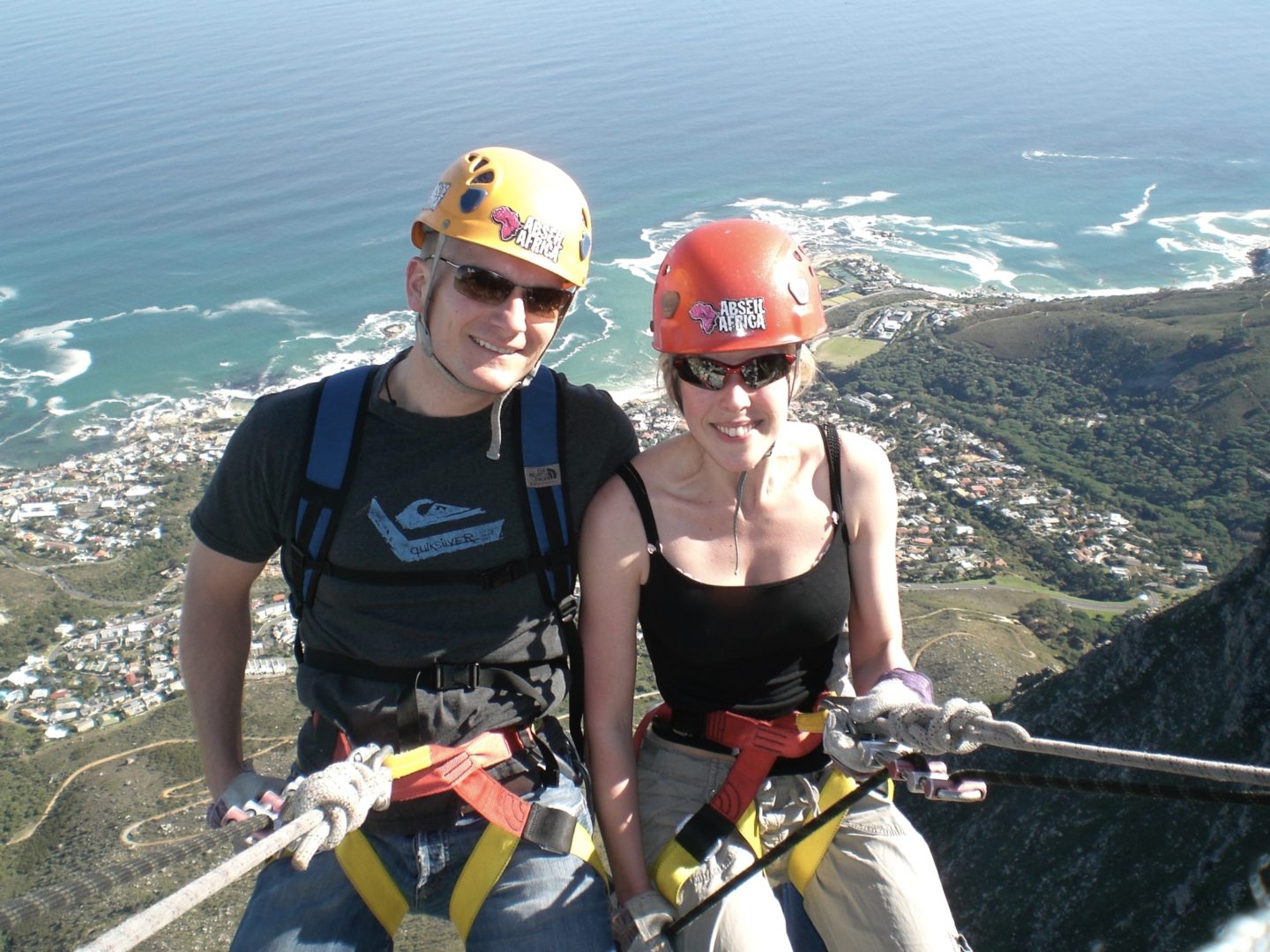 Mr and Mrs Wanderlust abseiling off Table Mountain 