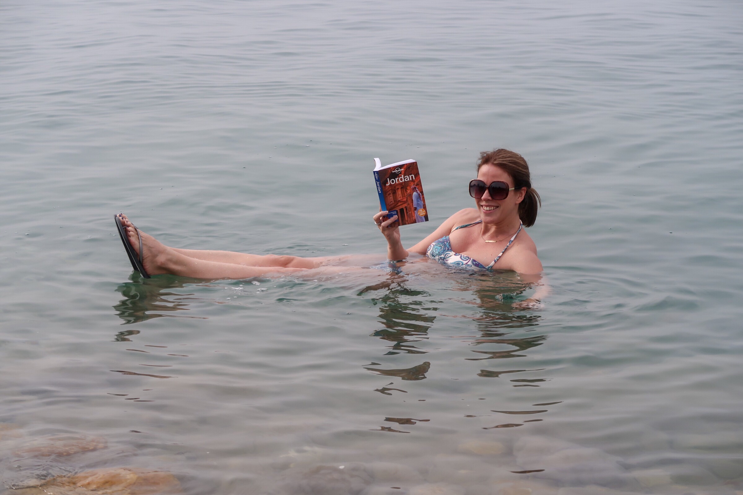 Jordan Adventures Part 2 - the Dead Sea. Me reading my Lonely Planet in the Dead Sea